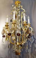 A French Louis XV style gilt-bronze and crystal chandelier. Ca 1900.